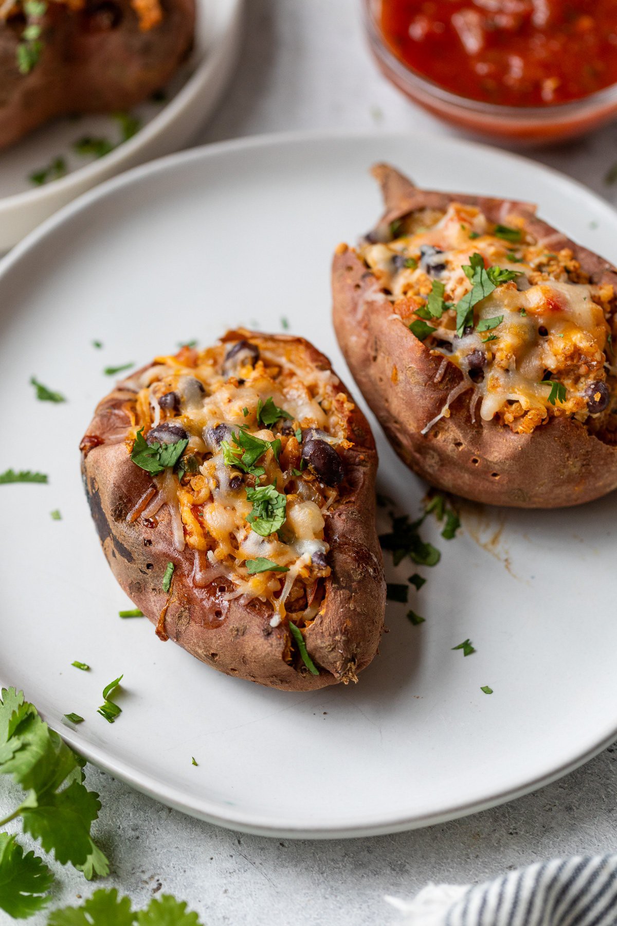 Quinoa, Cheese, and Black Bean Stuffed Sweet Potatoes